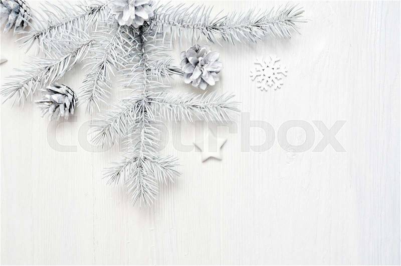 Mockup Christmas frame white tree branches border over white wooden background, with space for your text, stock photo