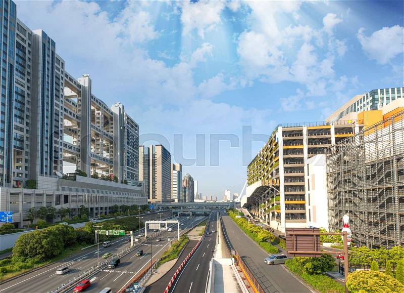 TOKYO, JAPAN - MAY 2016: Odaiba main road with traffic. Odaiba is a large artificial island in Tokyo Bay, stock photo