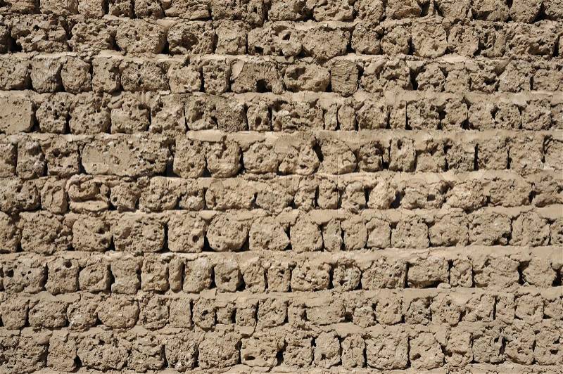 Old adobe wall in Dubai, United Arab Emirates, stock photo