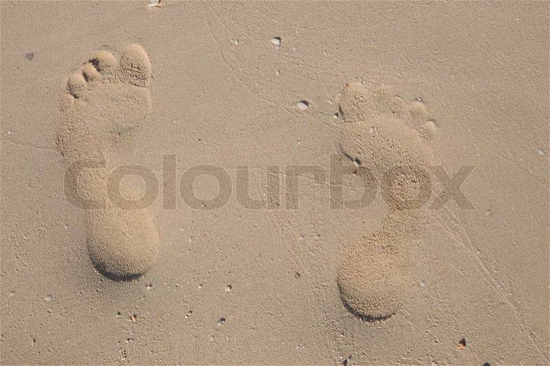 Footprint on the beach, stock photo