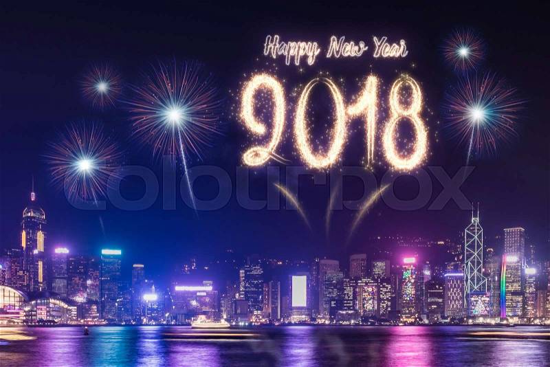 Happy new year 2018 firework over cityscape building near sea at night time celebration,Holiday festival greeting card,countdown time, stock photo