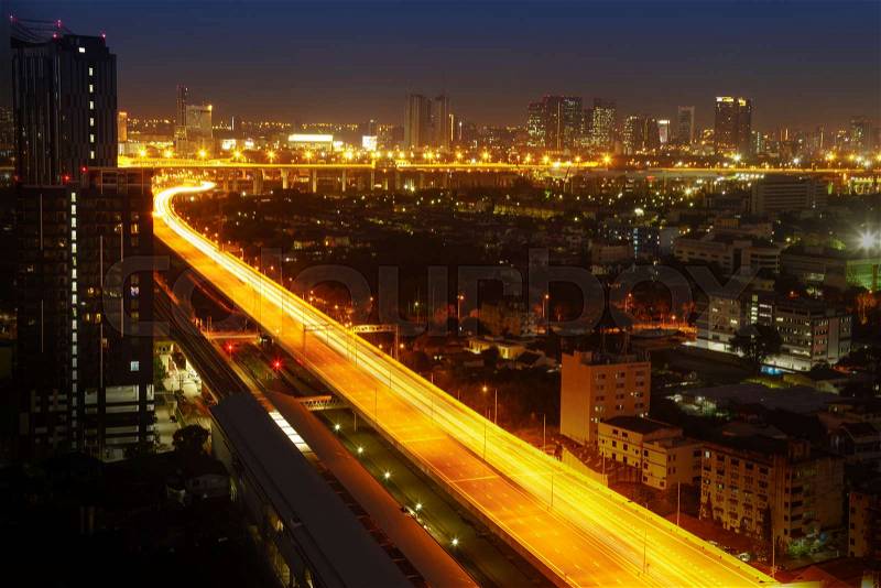 Transportation in modern city, Street night light, light trails at night on motorway, urban view at night time, stock photo