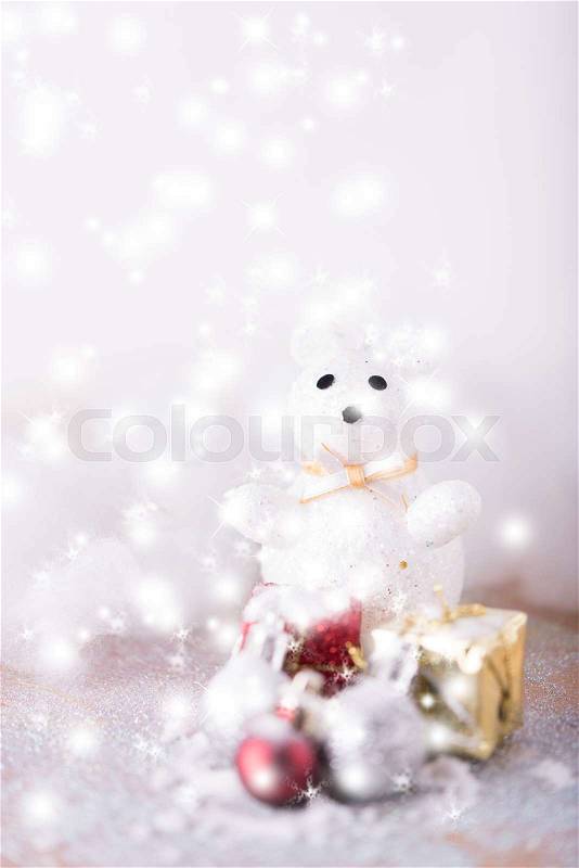 Christmas decoration with red, silver balls,cute bear and gift box ornaments over with background, stock photo
