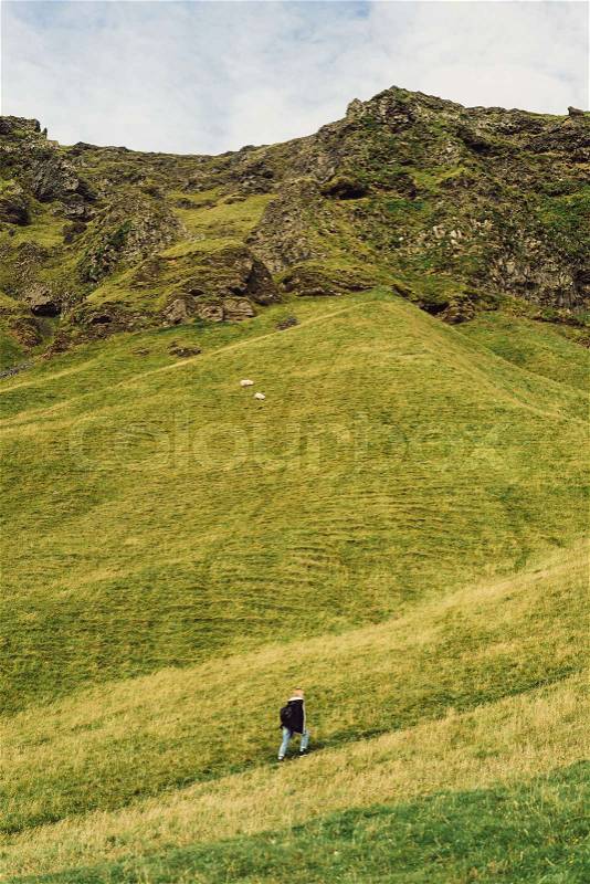 High angle view of person walking on footpath and beautiful landscape in Iceland, stock photo