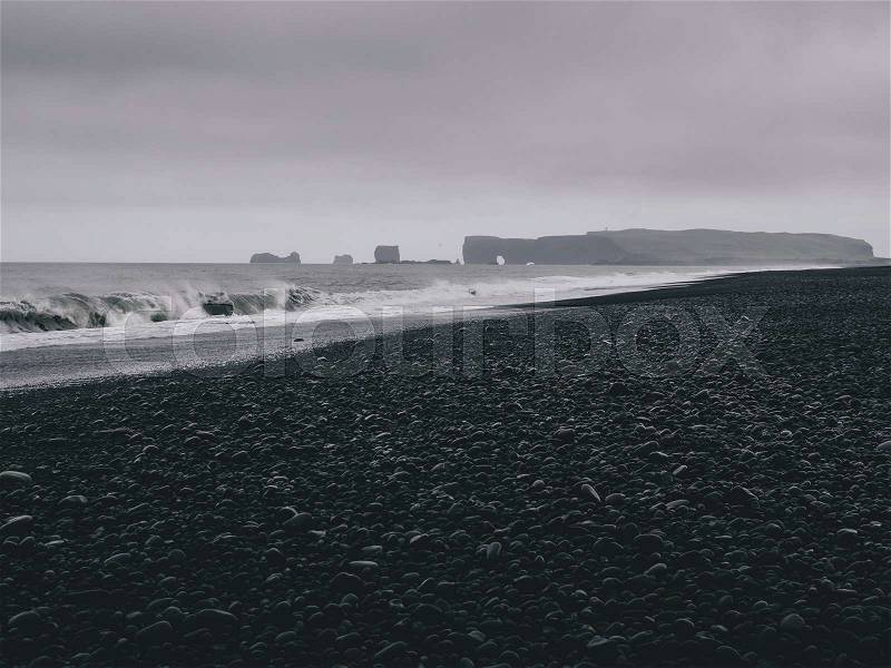 Black sand beach at cloudy day, Vik, Iceland, stock photo