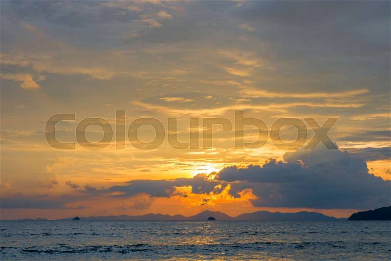 Stunning sunset sky over the sea at sunset time, stock photo