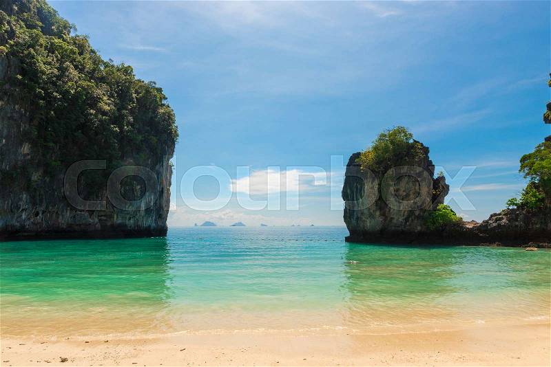 Rocks, the sea, the beach on a sunny day is an ideal place to relax, stock photo