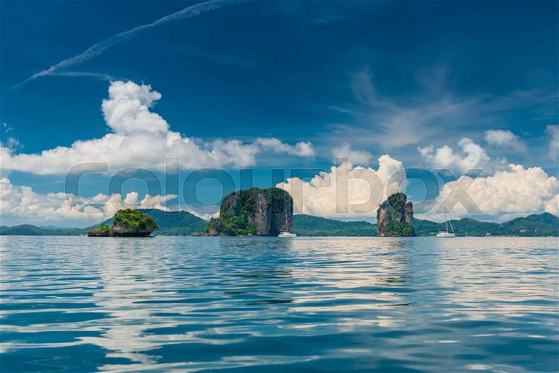 Pleasure yachts near the picturesque islands of Thailand, Krabi resort, stock photo
