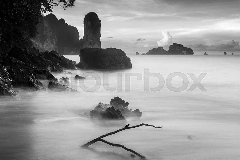 Black and white landscape with rocks in the sea at dawn Thailand, Krabi province, stock photo