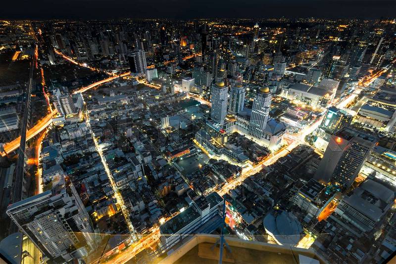 Streets of Thailand, the very center of Bangkok at night, the top view of the route, stock photo