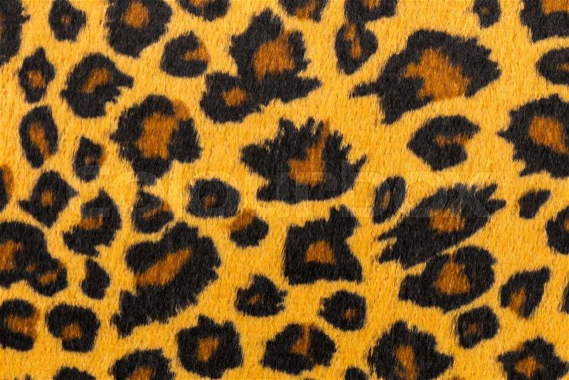 Closeup artificial tiger skin pattern Background, stock photo