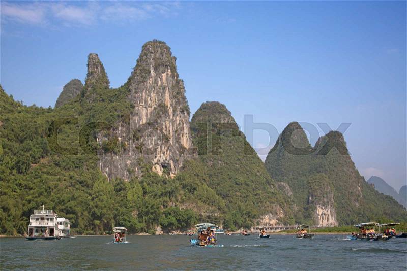 The Li River or Lijiang is a river in Guangxi Zhuang Autonomous Region, China. It flows 83 kilometres (52 mi) from Guilin to Yangshuo and famous for landscape formed by karst rocks, stock photo
