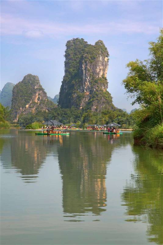 The Li River or Lijiang is a river in Guangxi Zhuang Autonomous Region, China. It flows 83 kilometres (52 mi) from Guilin to Yangshuo and famous for landscape formed by karst rocks, stock photo