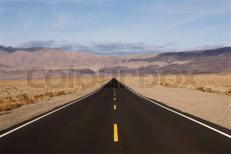 Dessert road with yellow stripes, stock photo