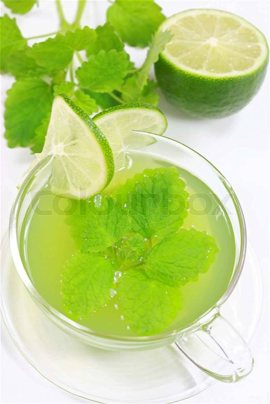 Herbal green tea with fresh mint and lemon, stock photo