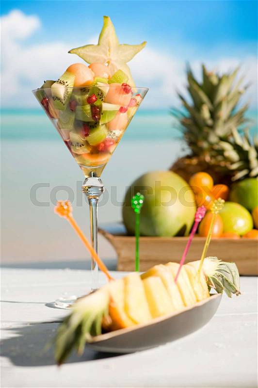 Fruit cocktail and a pineapple dish, stock photo