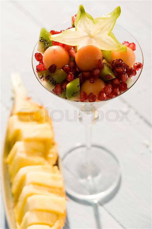 Fruit cocktail and a pineapple dish, stock photo