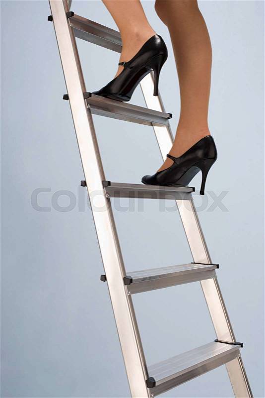 Climbing the career ladder, stock photo