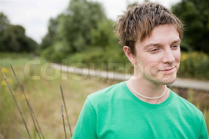 Young man thinking, stock photo