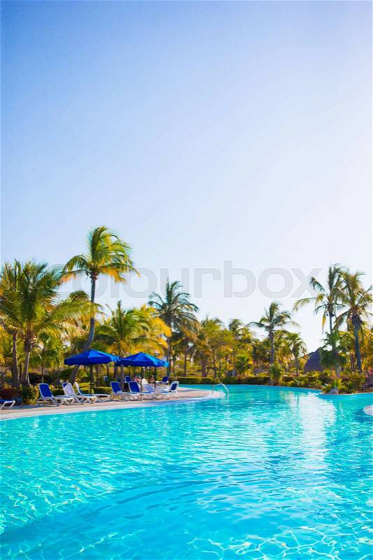 Beautiful luxury landscape around swimming pool in hotel resort, stock photo