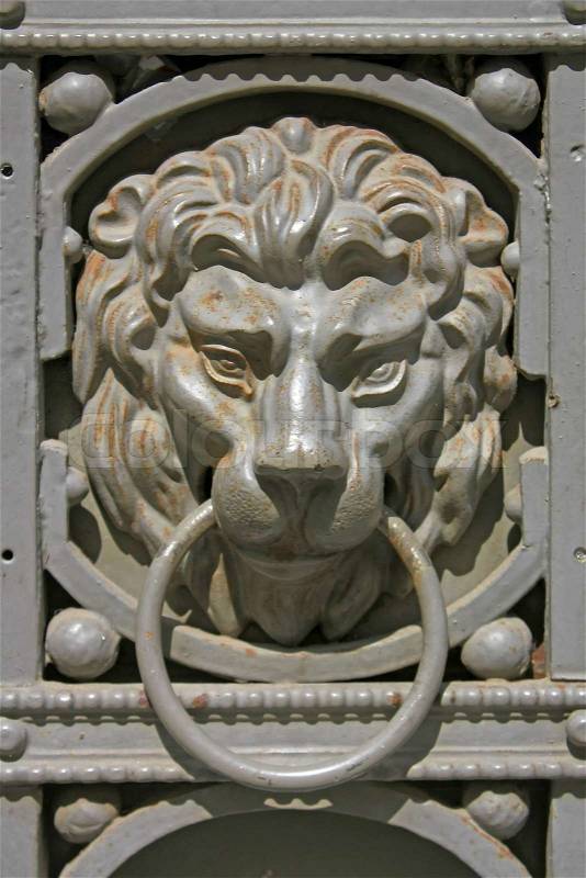 Lion knocker, stock photo