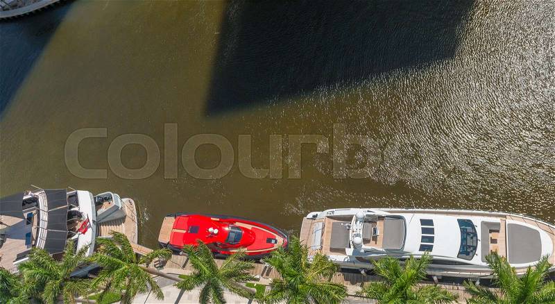 Docked boats in the port, aerial overhead view, stock photo