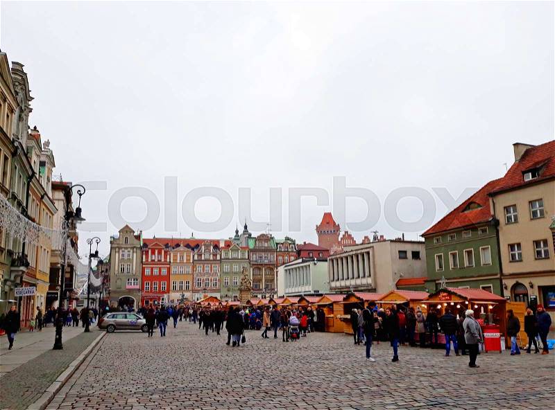 Poznan, Poland - 02 December 2017: Unidentified people trade food in annual traditional Christmas fair, stock photo