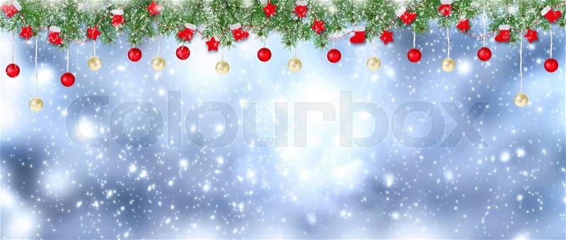 Christmas banner. Santa boots, gloves, stars and balls hanging on spruce garland on snowing background. New Year winter holidays concept. Empty place for photo or text. Copy space, stock photo