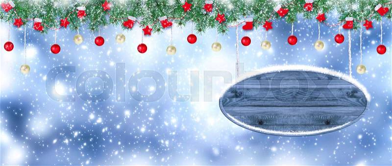 Christmas banner. Santa boots, gloves, stars and balls hanging on spruce garland and signboard on snowing background. New Year winter holidays concept. Empty place for decoration, text or advertising, stock photo