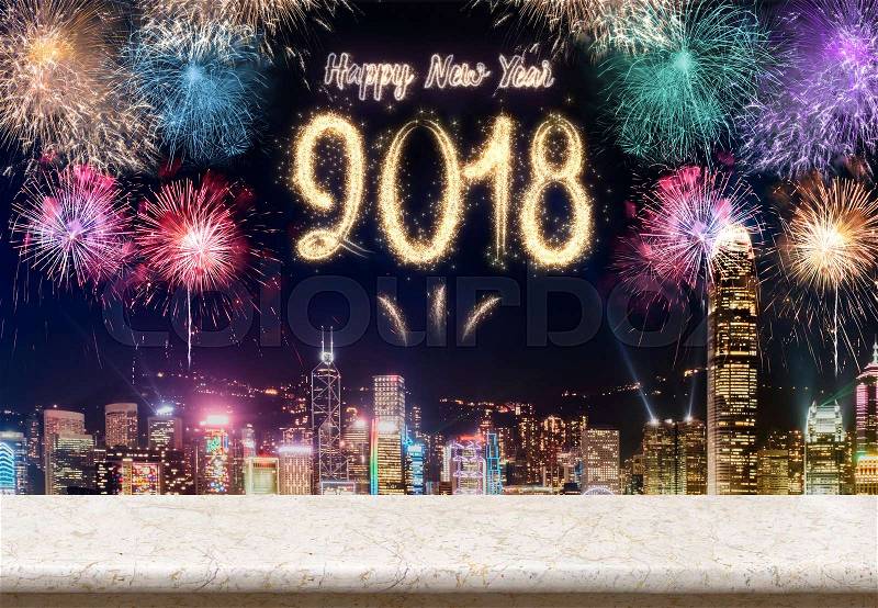 Happy new year 2018 fireworks over cityscape at night with empty marble table top,Mock up template for display or montage of product for holiday promotion advertising, stock photo
