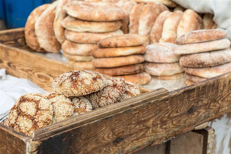 Typical traditional Moroccan bread sesame seeds on street food stall, Marrakesh, Morocco, stock photo