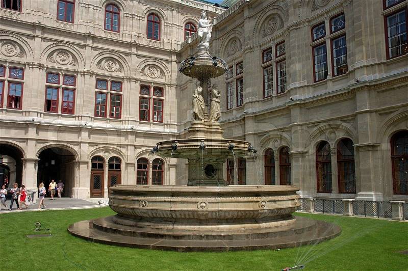 Statue with Fountain at the Vienna Opera, Austria, stock photo