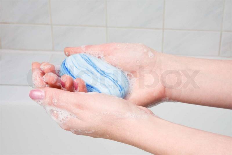 Hygiene and body care washing hands with soap, stock photo