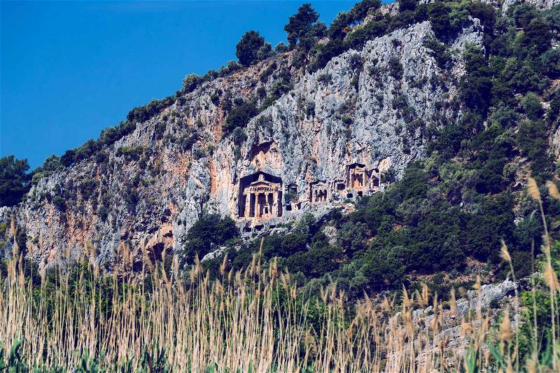 Ancient antique tombs of Lycian kings in the Taurus mountains, stock photo