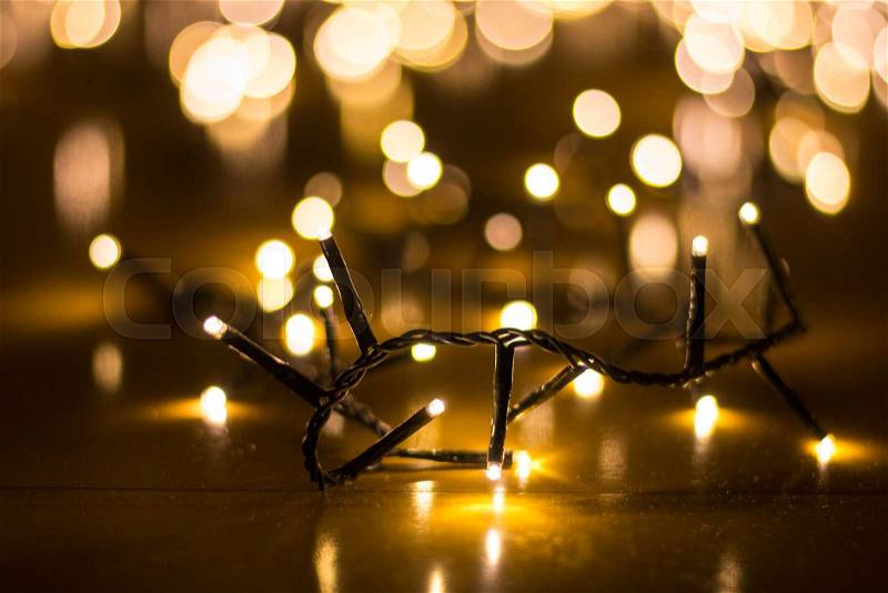 Fairy lights for the Christmas tree with blurry background close up, stock photo