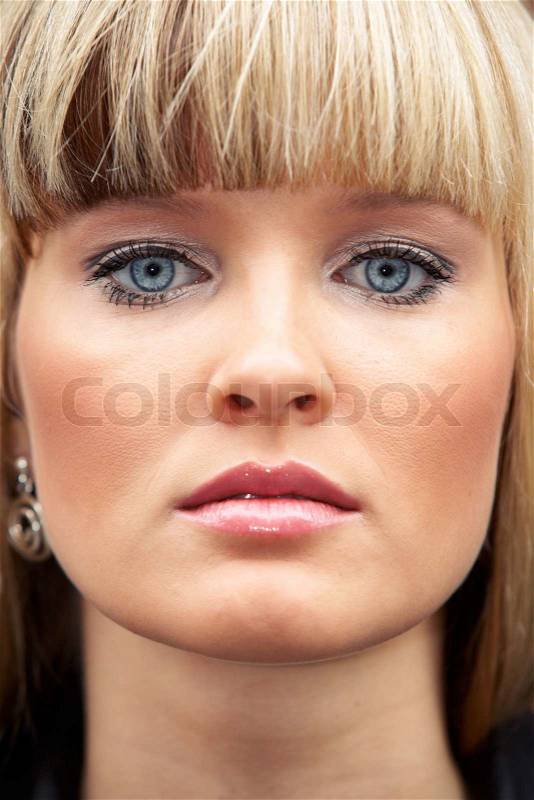 Close-up of face of young woman, full frame, stock photo
