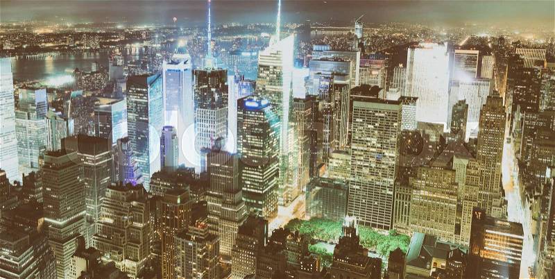 New York City by night. Aerial view of Manhattan lights, USA, stock photo