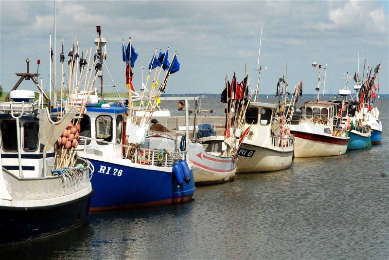 A Row Of Fishing Boats wityh Flags / Western Denmark, stock photo