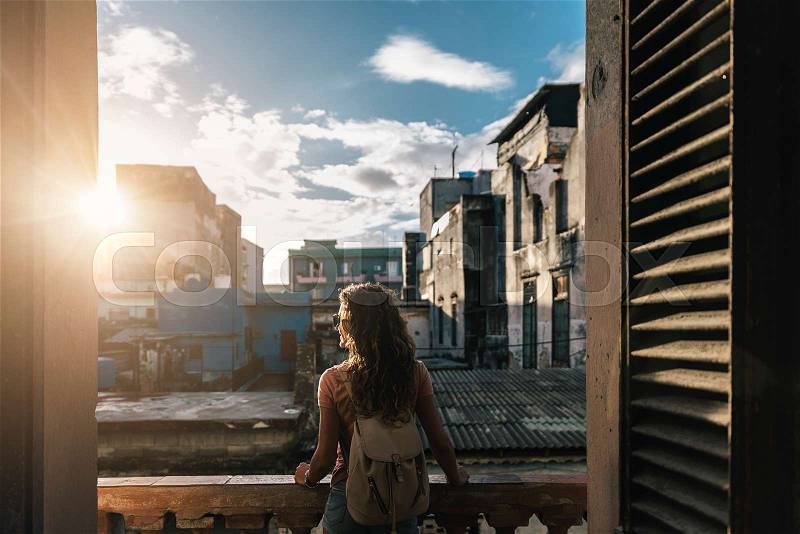 Back view of beautiful woman looking the city. Travel Concept, stock photo