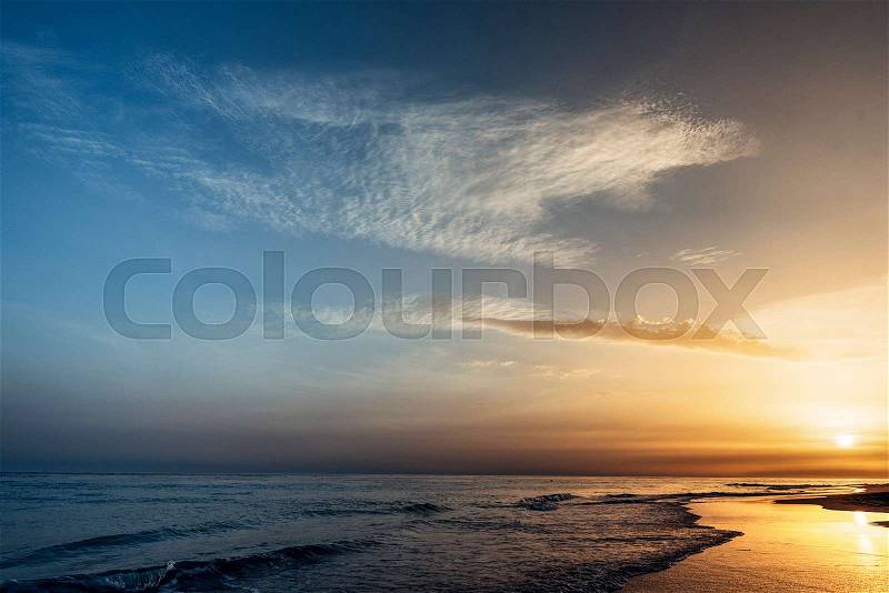 Beautiful beach in the sunset moment. Vacation Concept, stock photo