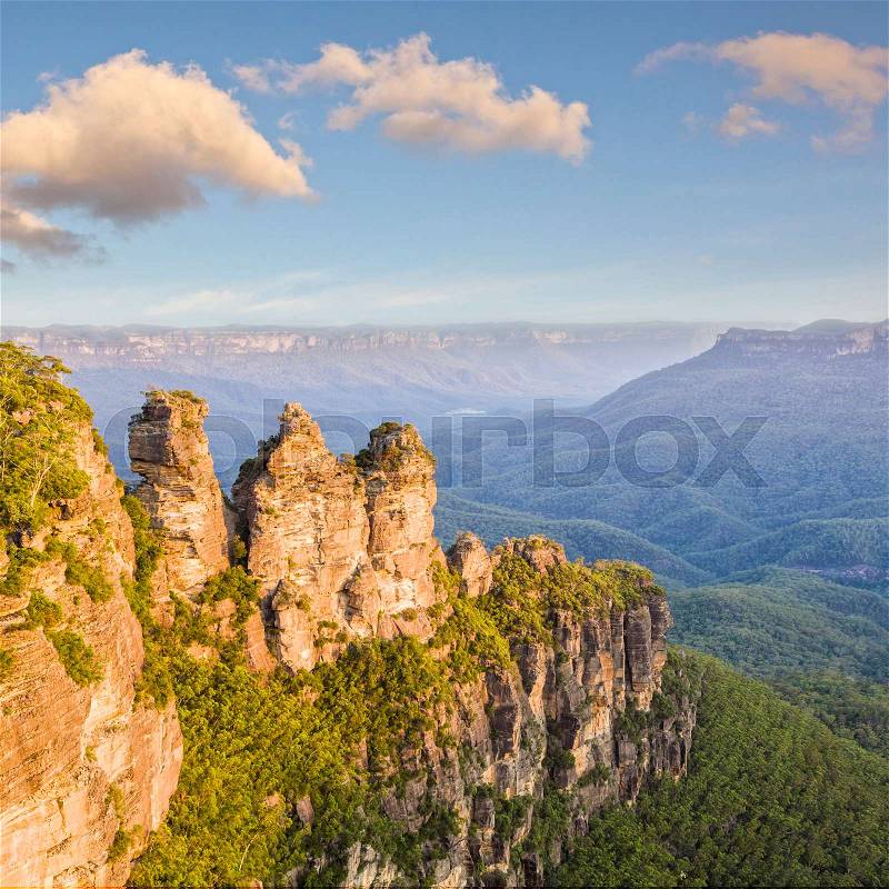 Three Sisters Katoomba Australia - Three Sister rock formation at Katoomba in the Blue Mountains of NSW, one of Australia\'s most famous tourist landmarks. Haze is caused by the oil from the Eucalypts, stock photo