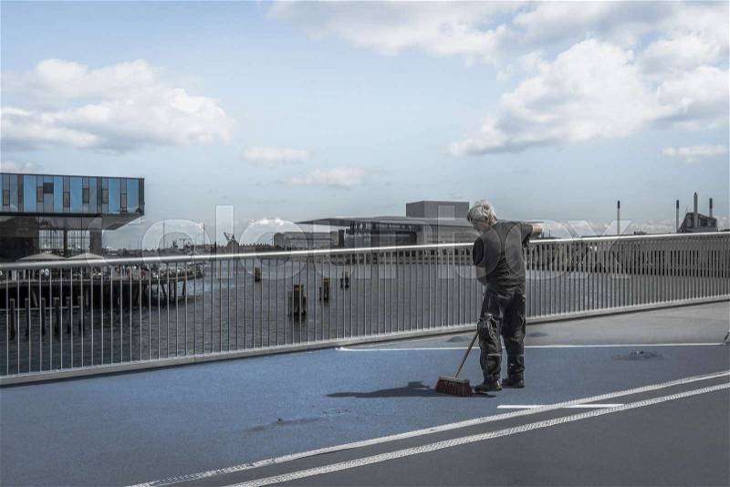 Repairing the slippery surface of the inner port bridge in Copenhagen, Denmark, July 13, 2016, stock photo