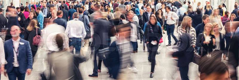 Business people crowd at a trade fair, banner size. ideal for websites and magazines layouts, stock photo