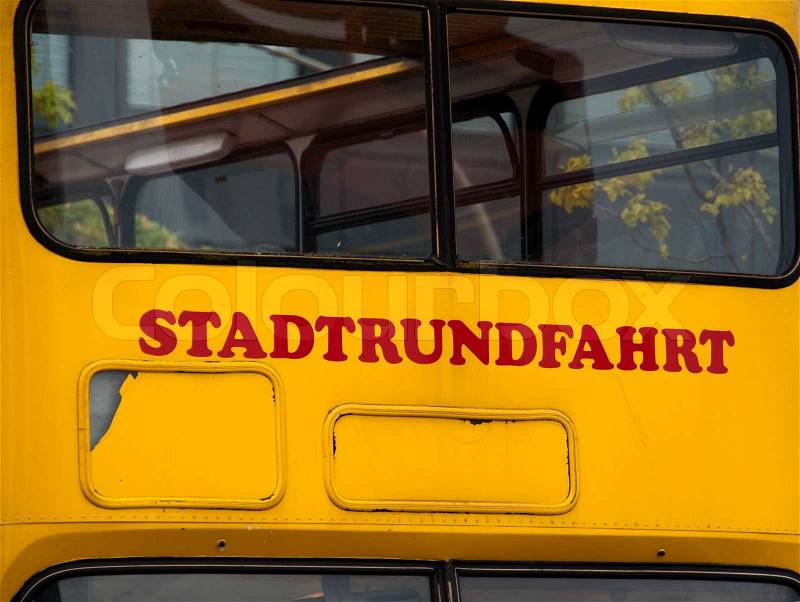 Doubledecker bus with German word Stadtrundfahrt Sightseeing trip painted on its front, stock photo