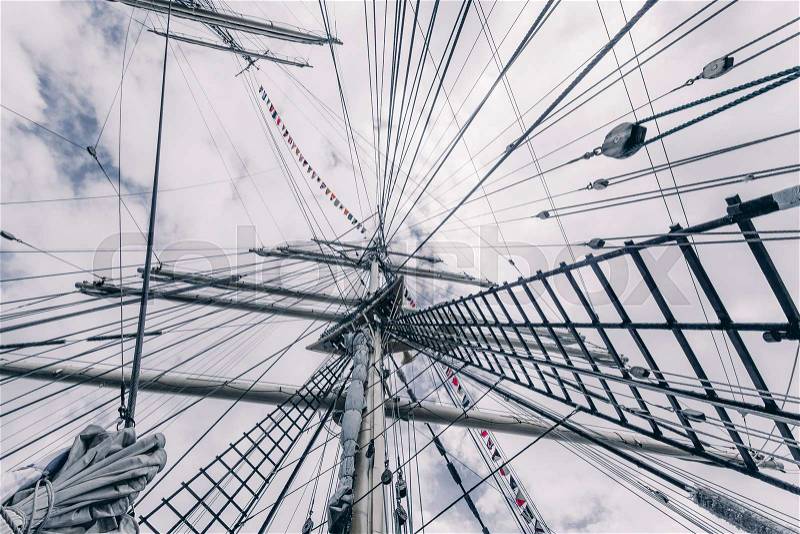 Old sailing ship mast. Tall ship rigging detail. Masts and rigging of a sailing ship, stock photo