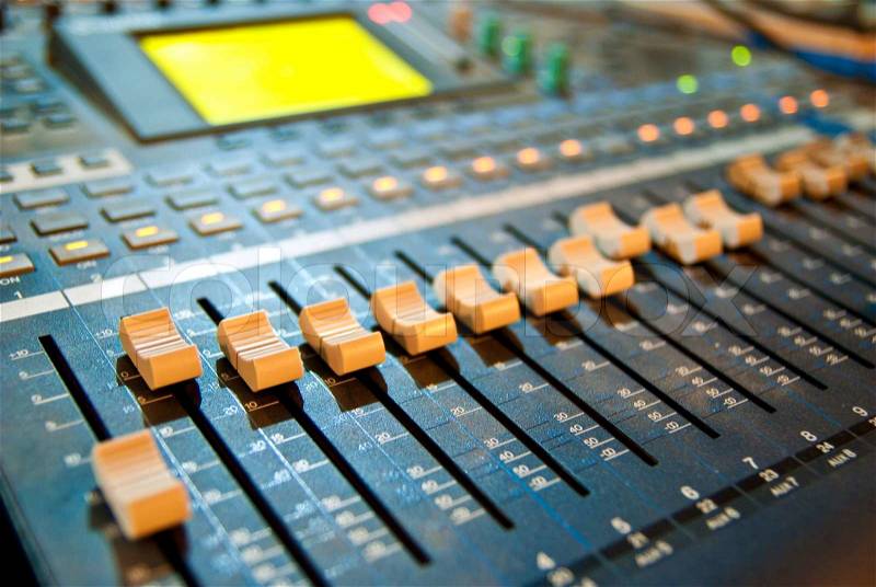 Music mixer in studio closeup, stock photo