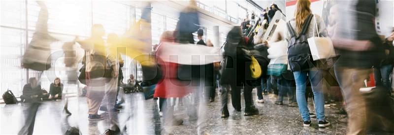 Abstract blurred crowd of people in in motion. ideal for websites and magazines layouts, stock photo