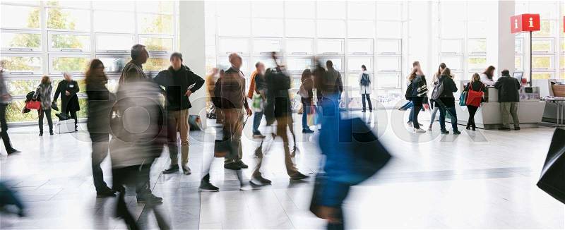 Abstract blurred business people rushing on a airport. ideal for websites and magazines layouts, stock photo