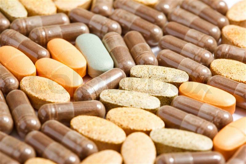 Medicinal pills piled up a bunch of closeup, stock photo