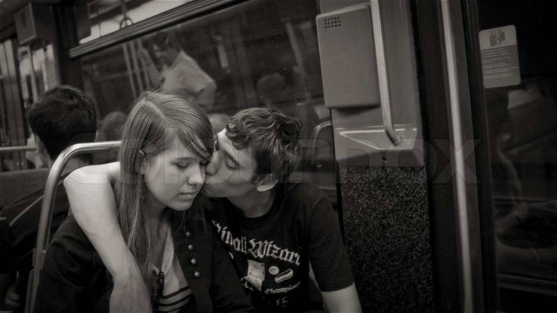 I LOVE YOU MY DEAR, PARIS, FRANCE - APRIL 24, 2011: Young couple in love enjoying themselves in the Metro of Paris, stock photo